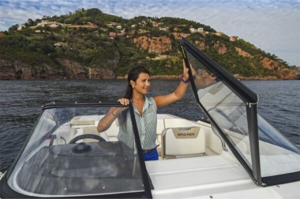 woman touching the boat windshield